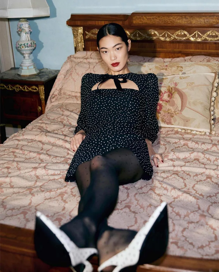 A model wearing a Reformation dress.