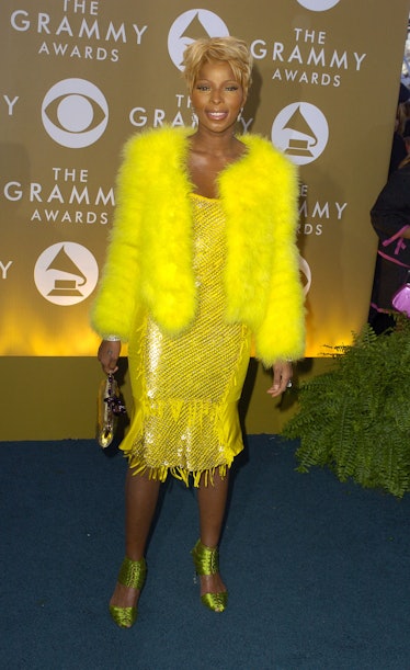 Mary J Blige in yellow coat. 