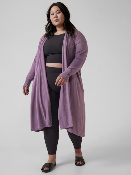 Model wearing a long cardigan from Athleta's Black Friday sale.