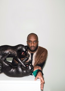 Virgil Abloh and panther statue. 