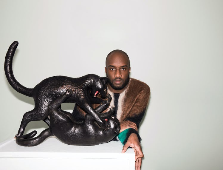 Virgil Abloh and panther statue. 