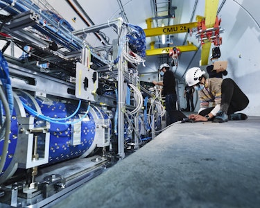 scientists working on FASER at CERN