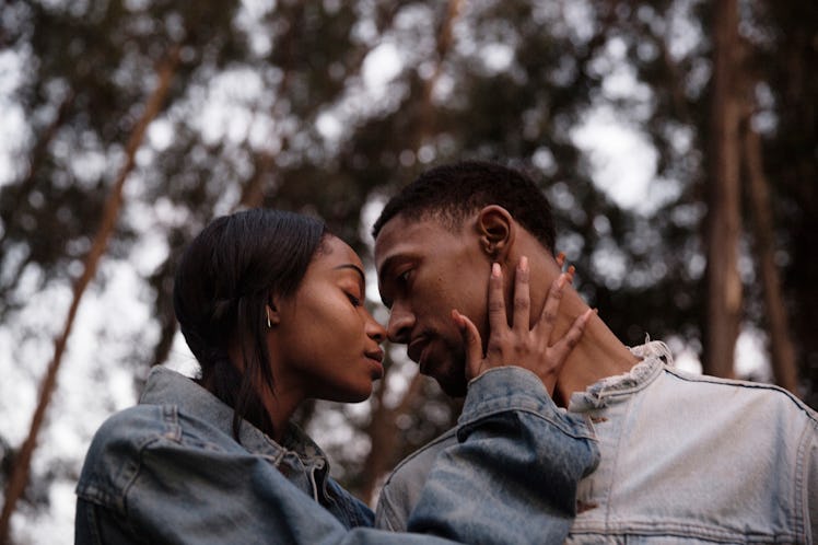 Couple nearly kissing, showing Sagittarius best match.