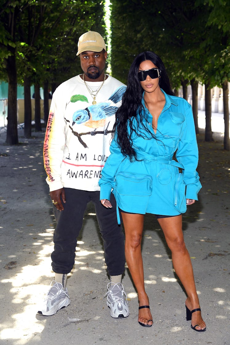Kim Kardashian and Kanye West at Louis Vuitton show