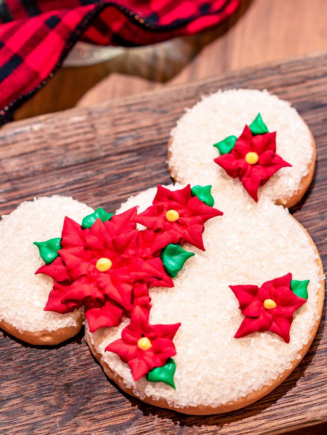 The Disneyland 2021 Holiday Food Guide includes Mickey-shaped holiday cookies. 