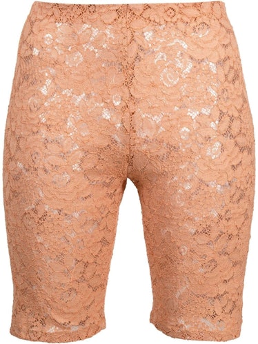 Coral Pink floral-lace cycling shorts from Stella McCartney, available to shop on Farfetch.