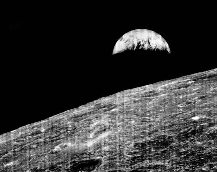 The first image of Earth, taken from orbit around the Moon by Lunar Orbiter 1. 