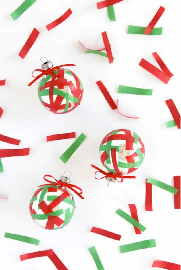 Kids can make DIY confetti ornaments with strips of tissue paper.