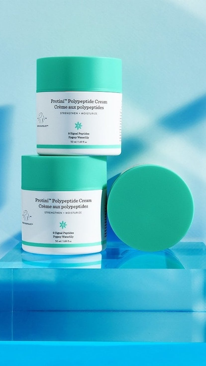 Three bottles of Drunk Elephant's Protini Polypeptide Cream, which has affordable dupes.