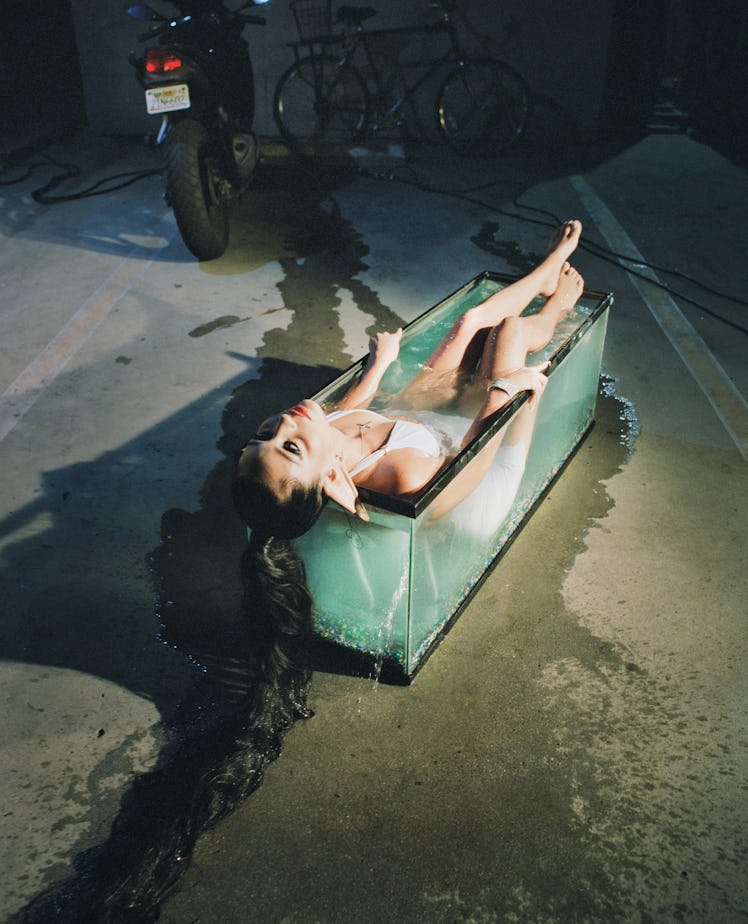 Alexa Demie in a water tank