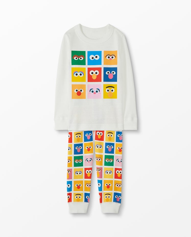 Flat lay of PJs featuring Sesame Street characters 