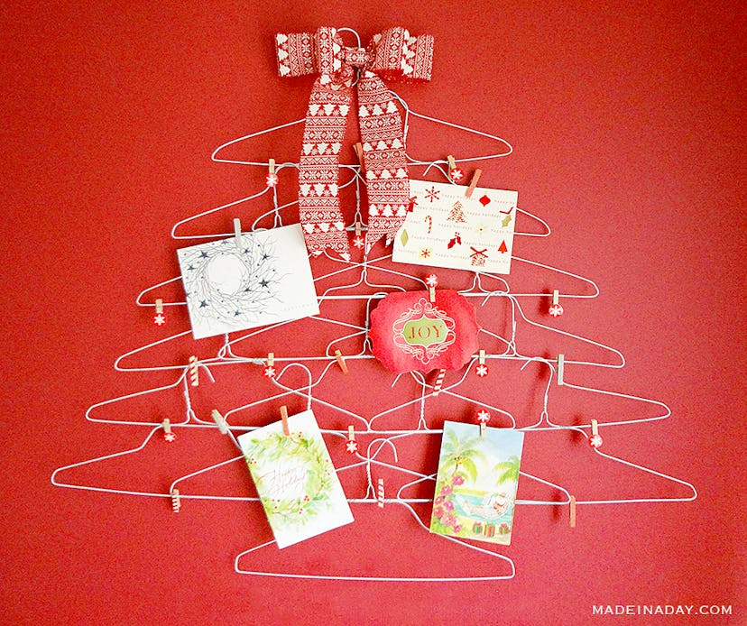 Made in a Day's wire coat hanger holiday card holder is a simple DIY way to display holiday cards