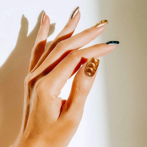 Magnetic nail polish is a great way to get cat eye velvet nails at home. 