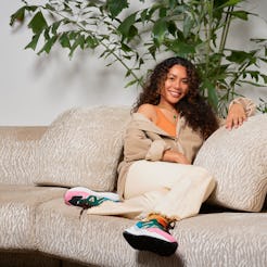 CEO of Latinx, Brittany Chavez, sitting on a couch