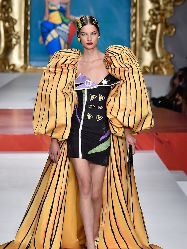 Faretta walks the runway at the Moschino show during the Milan Fashion Week Spring/Summer 2020