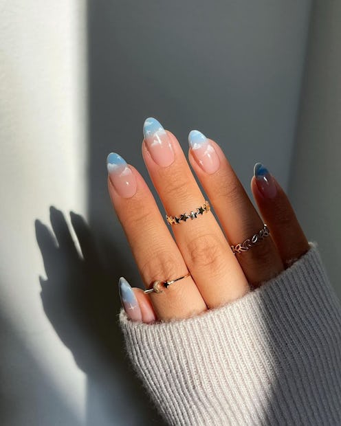 How to wear the super cute cloud nail art trend.