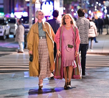 Miranda and Carrie walking down the street