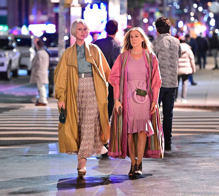 Miranda and Carrie walking down the street