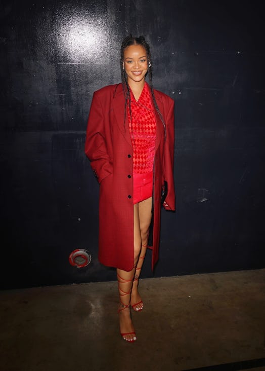 Rihanna wears a red outfit and strappy heels to ASAP Rocky's concert at ComplexCON.