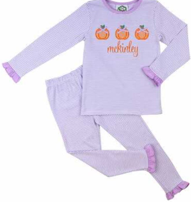 Image of 2-piece kid's personalized pajama top and bottom, with lavender stripes and pumpkin print.