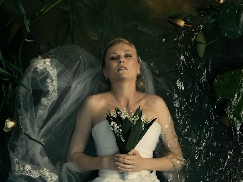Kirsten Dunst lying down in a wedding dress in the film Melancholia.