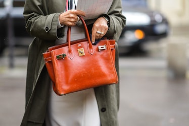 Hermès Birkin bag in a street style image.