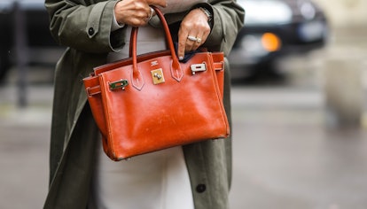 Hermès Birkin bag in a street style image.