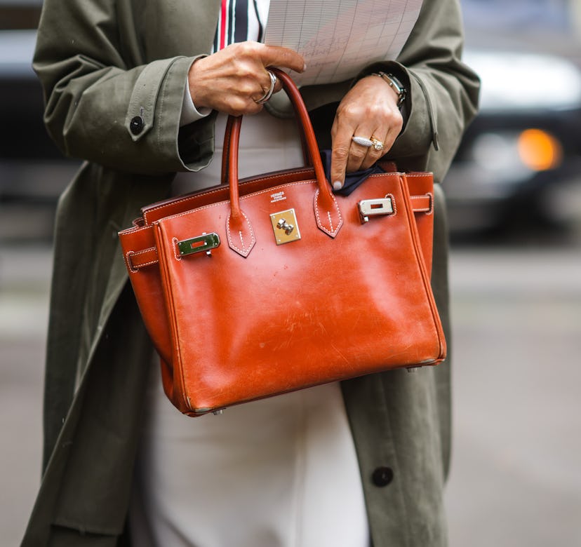 Hermès Birkin bag in a street style image.