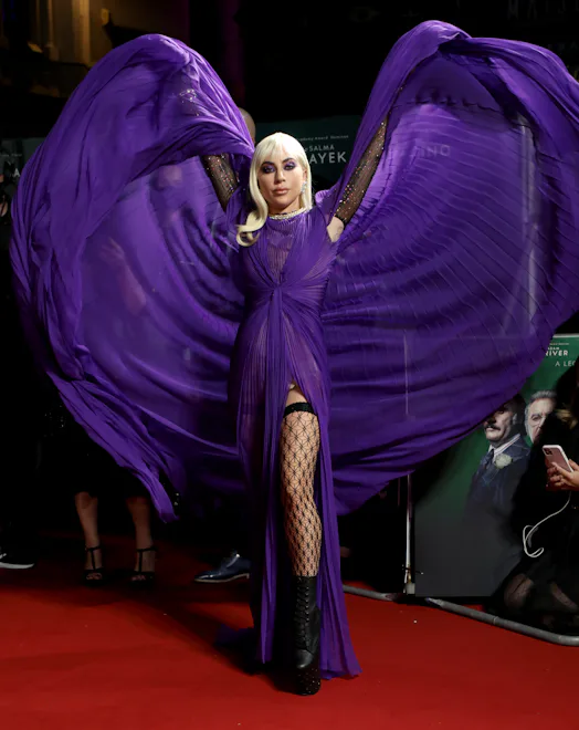 lady gaga house of gucci purple dress Lady Gaga spreads her wings at 'House of Gucci' premiere