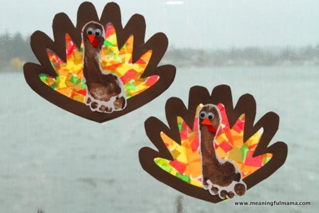 Colorful turkey Thanksgiving footprint crafts 