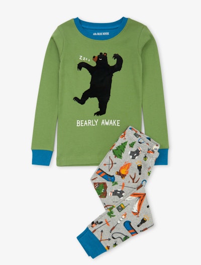 Flat lay of kids pajama set with bears and camp print