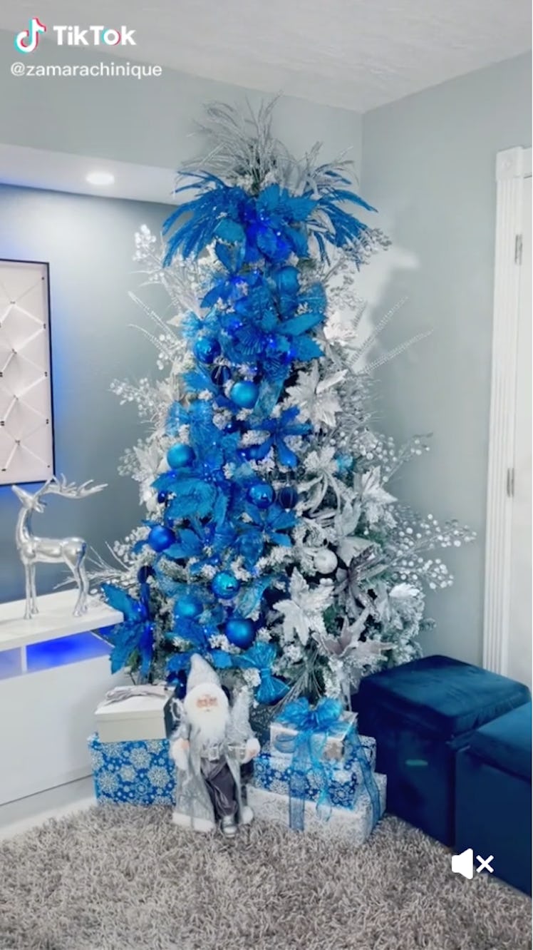 If you want a brighter version of a blue Christmas tree, add some white accents for an on-trend holi...