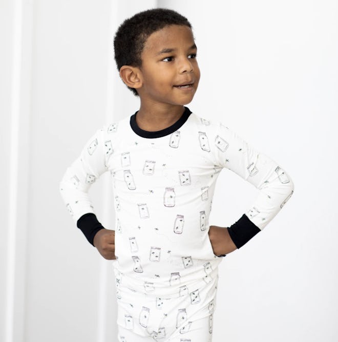 Little boy posing in long john pajamas 