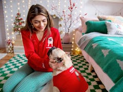 Here's how to get PetSmart's custom embroidered Pawliday Sweater set with you and your pets' faces o...