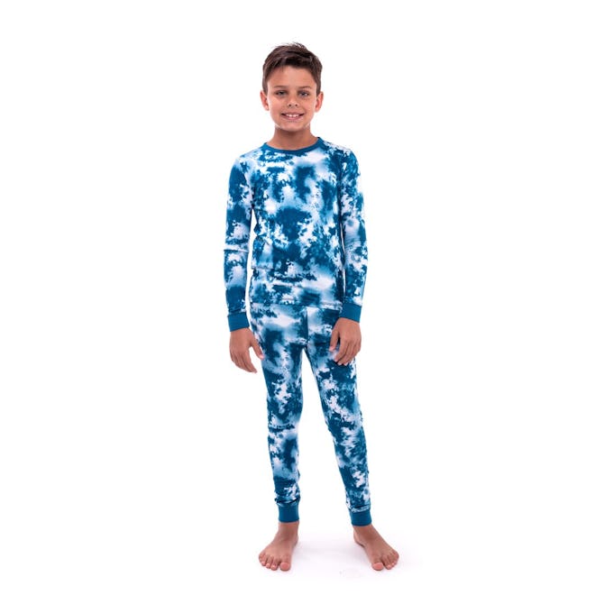 Boy modeling blue tie-dye long-john PJs