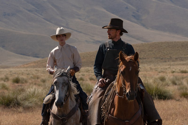 (L-R) Kodi Smit-McPhee and Benedict Cumberbatch in Jane Campion's 'The Power of the Dog' (2021). Pho...