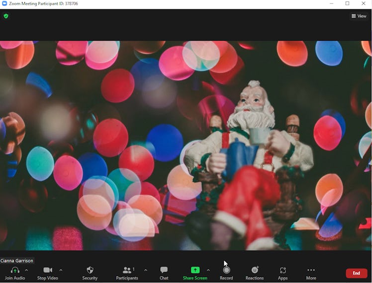 These holiday Zoom backgrounds include merry imagery like trees, lights, and Santa Claus.