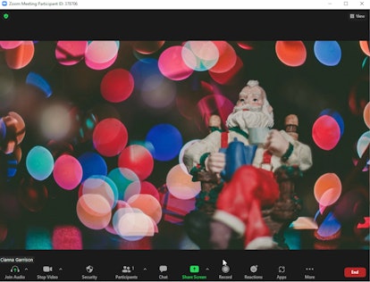 These holiday Zoom backgrounds include merry imagery like trees, lights, and Santa Claus.