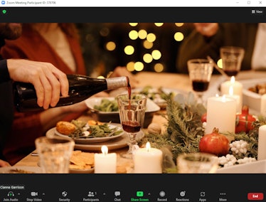 These holiday Zoom backgrounds include a festive dinner table scene.