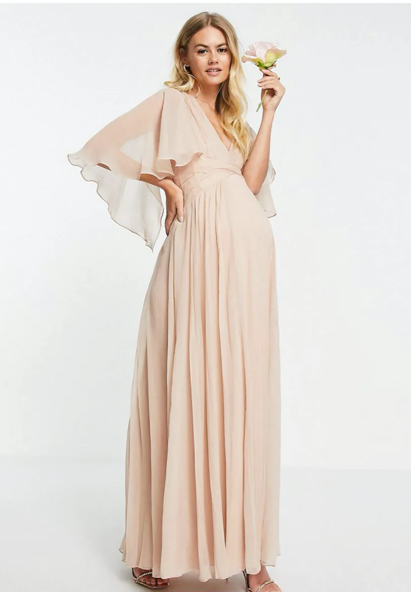 15 Dazzling (& Comfy) Maternity Party Dresses For All Occasions