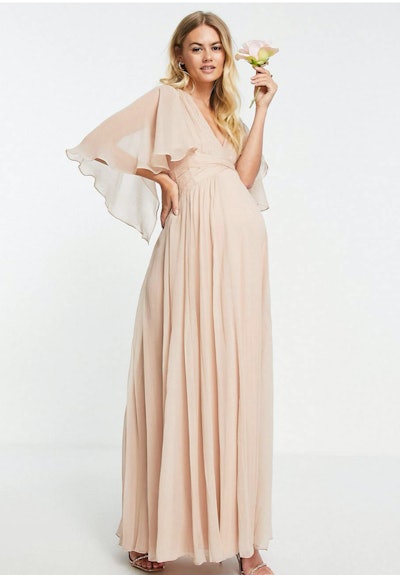 Maternity Bridesmaid ruched bodice drape maxi dress with wrap waist and flutter cape sleeve in blush