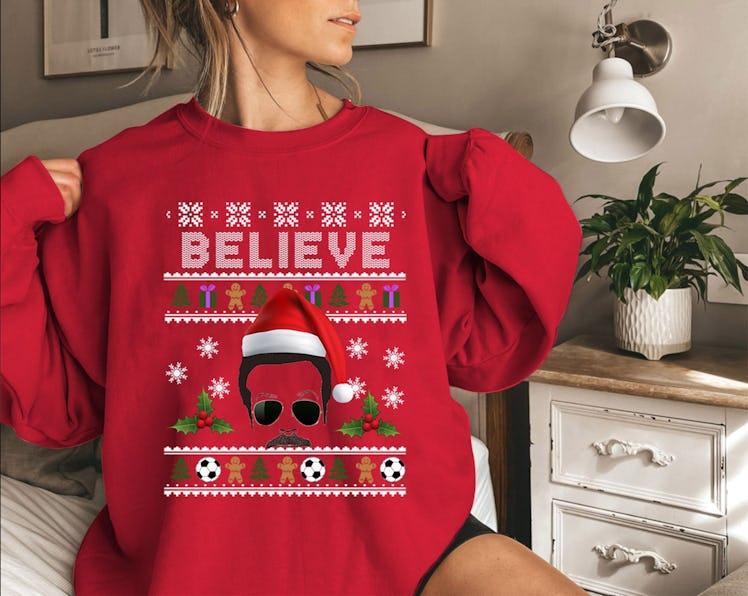 This 'Ted Lasso' ugly Christmas sweater has Ted's face on the front. 
