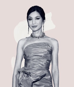 A black and white photo of Gemma Chan on a pink and white background 