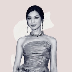 A black and white photo of Gemma Chan on a pink and white background 