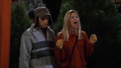 Joey and Phoebe stand in a Christmas tree lot, Phoebe screaming, in "The One Where Rachel Quits"