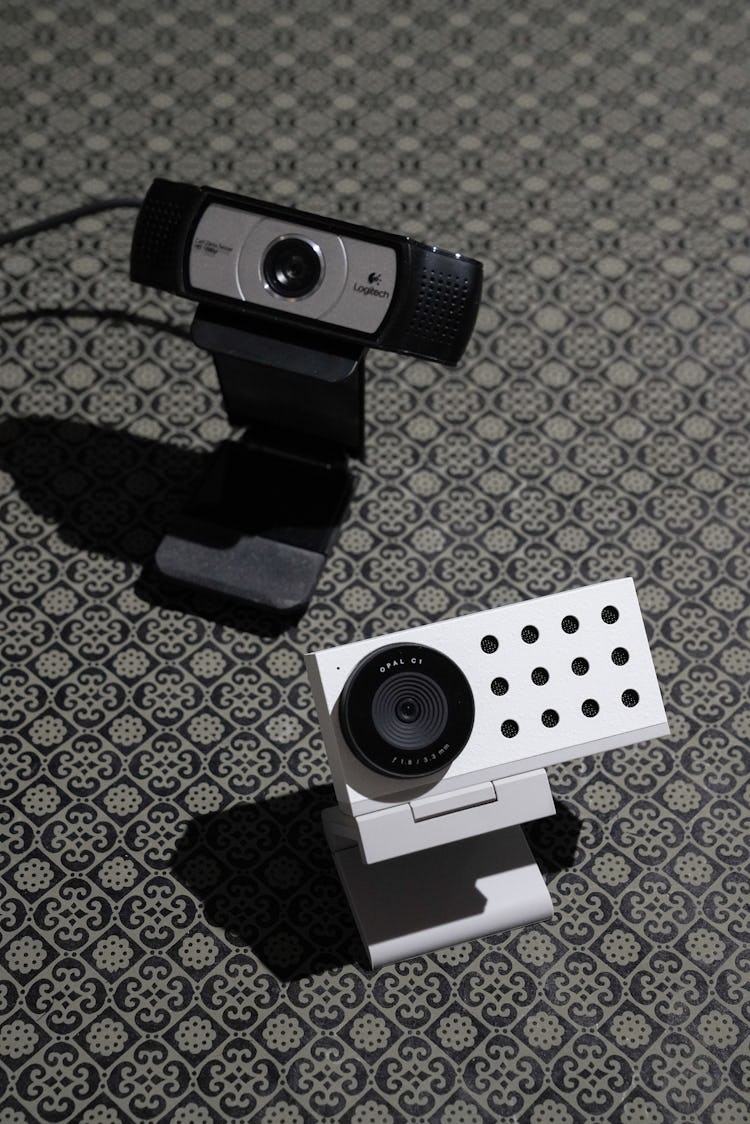 Opal C1 webcam size comparison with Logitech C930e webcam.