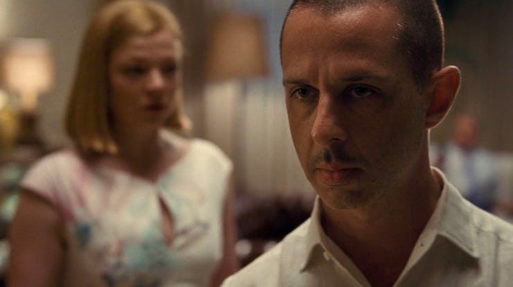 Kendal standing in front of siobhan on a episode of succession