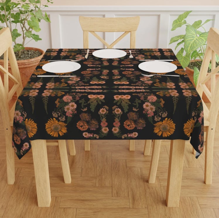 This black floral tablecloth has the dark cottagecore aesthetic for home decor. 