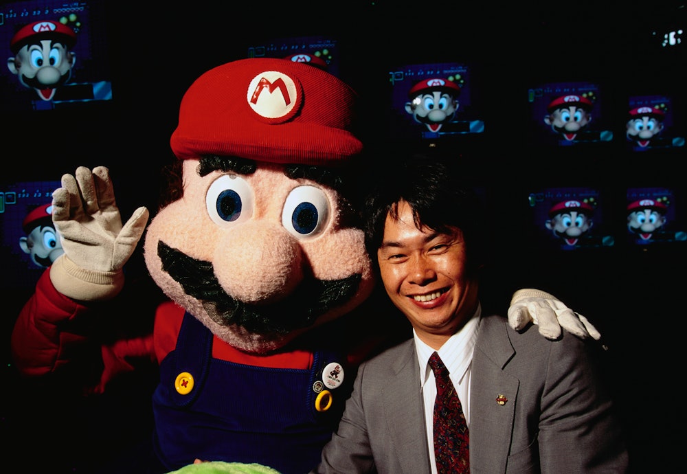 shigeru miyamoto and mario in 1992