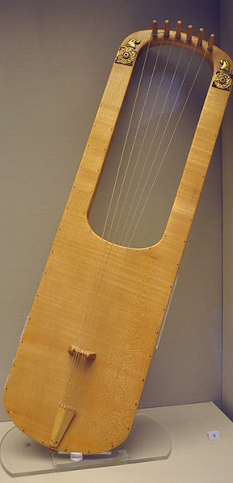 	Replica of the Sutton Hoo large lyre. Maplewood, with electrotyped fittings, bone bridge and gut st...